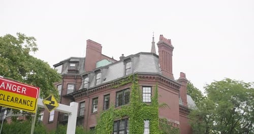Establishing Shot of Brick Building with Ivy