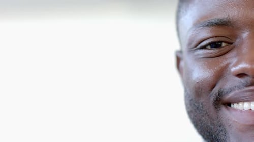 Close-up of an African American man smiling, with copy space