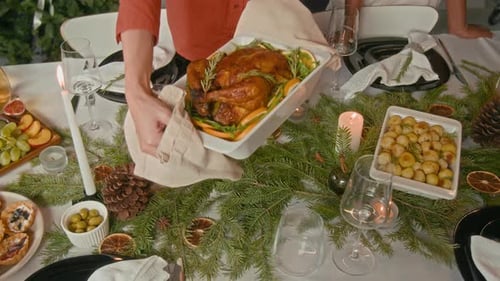Holiday Feast with Turkey on Decorated Dining Table