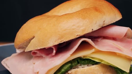 Bagel Sandwich Brunch Lunch Plate of a Bagel with Smoked Salmon and Cream Cheese and Ham Close Up