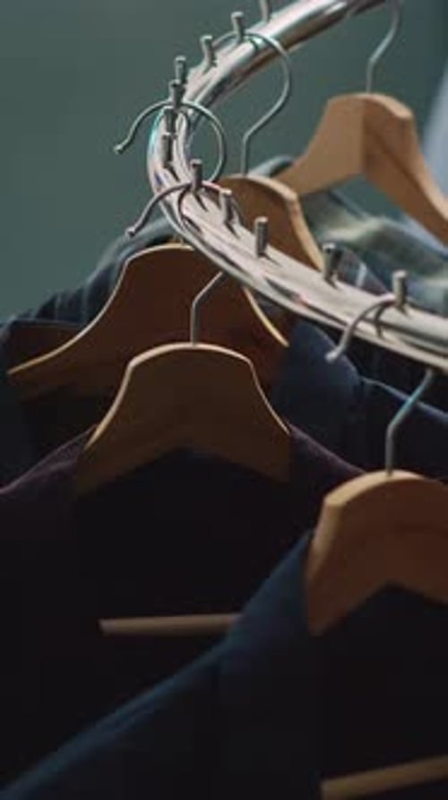 Vertical Video Empty Clothes Market Filled with Racks and Hangers