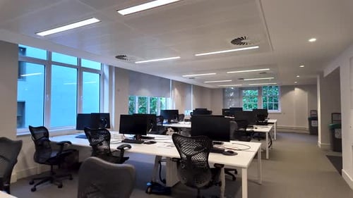 Empty modern open space office with nobody working from home