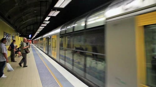 Subway carries passengers through a modern station in Sydney Australia