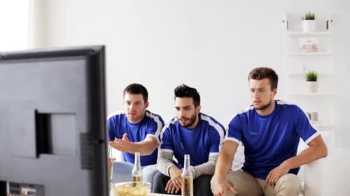 Friends Cheer Watching Sport Game Celebration Indoors