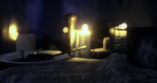 Warm Flickering Candlelight on Decorative Lace