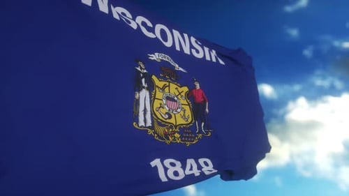 Waving Wisconsin State Flag Against Blue Sky