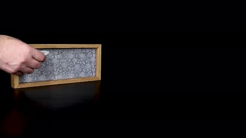 A wooden calendar block showing the date January 24th
