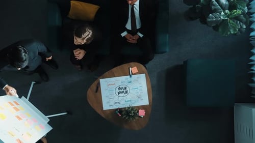 Top view of manager write whiteboard and share marketing strategy. Directorate.