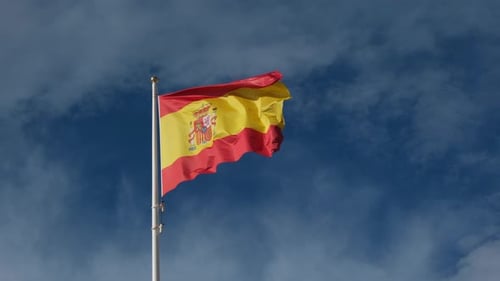 National Flag Waving Against a Blue Sky