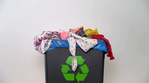 Adding Clothes to Recycling Bin for Textiles