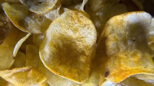 Macro Close-up of Crunchy Golden Potato Chips
