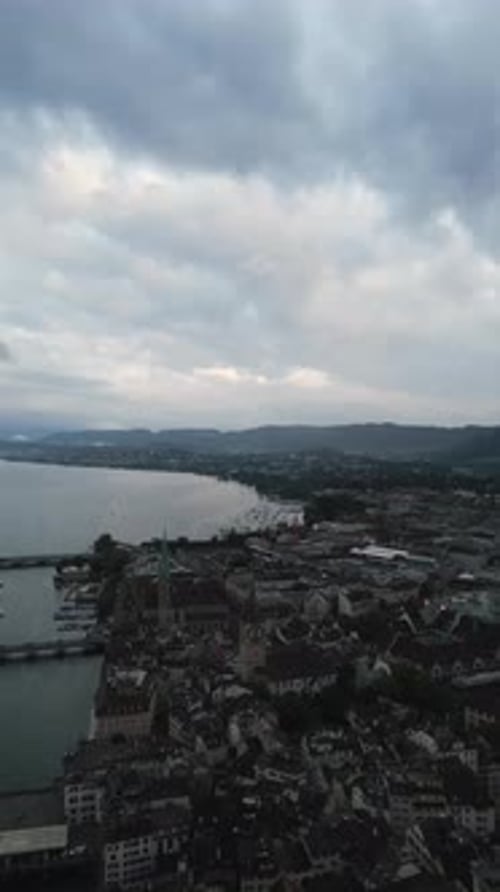 Aerial cityscape flythrough video of Zurich and River Limmat, Switzerland