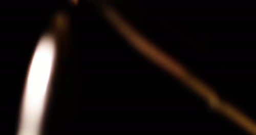 300 Blackout bullets falling before a dark background, slow motion, close-up