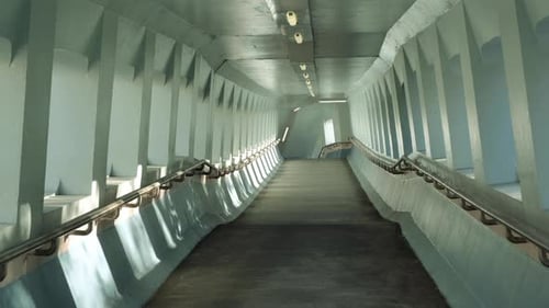 Walking the vintage pedestrian bridge in Hong Kong.