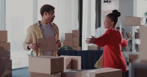 Cheerful Couple Celebrates Moving Into New Home