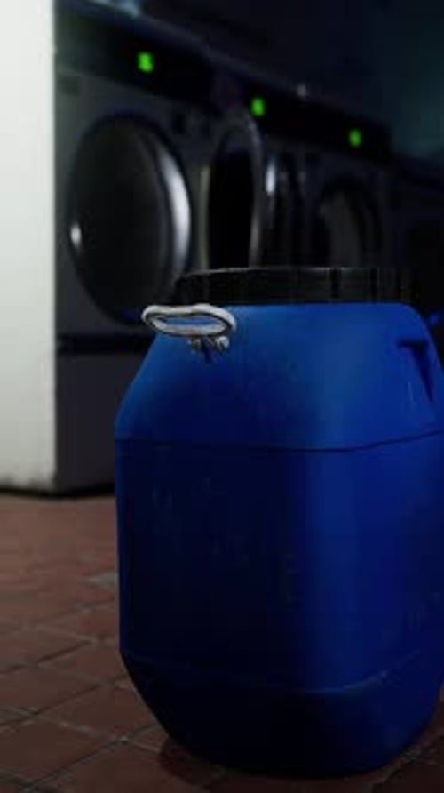 A Blue Barrel with a Black Lid