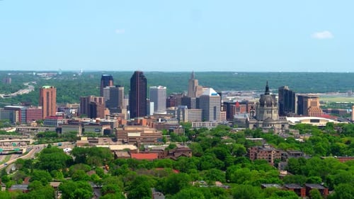 Minneapolis Minnesota skyline shines above the city buildings at sunset