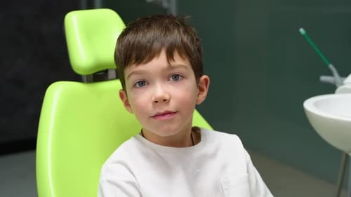 A Little Boy Put in the Mouth Orthodontic Plate