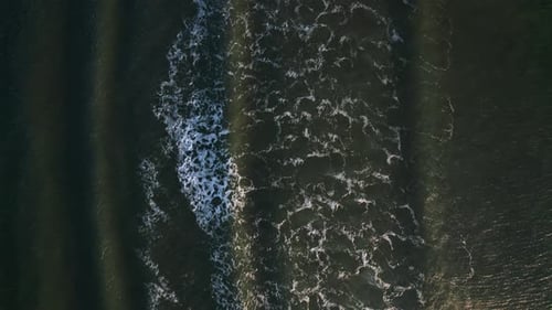 Abstract Top Down Ocean Waves in Sunset