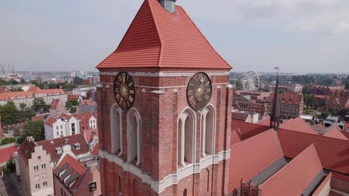 Drone Flight Around the Ancient Cathedral in the Center of the Old European Town with Tile Roofs