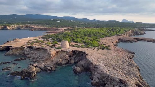 mediterranean coastal sunset ancient historic tower. Gorgeous aerial top view flight speed ramp Hype