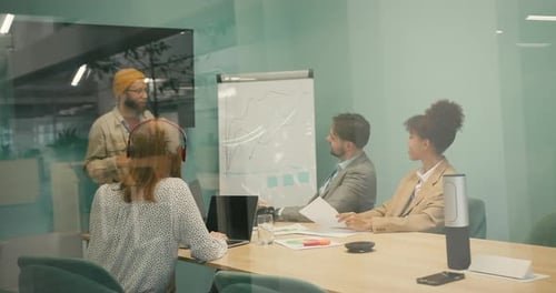 Diverse Professionals Collaborate in Modern Office Conference Room