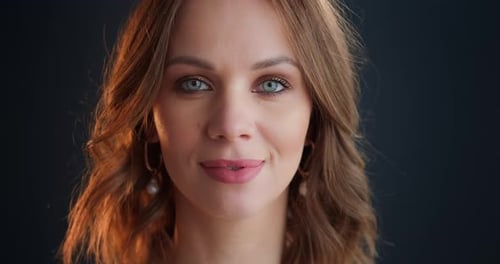 Elegant Woman Smiling in Close Up