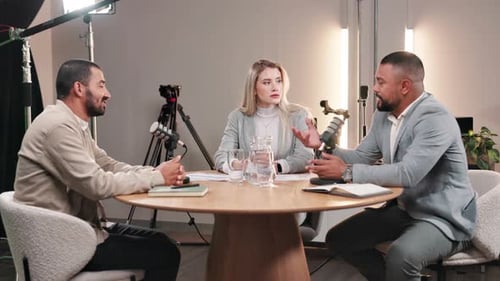 Podcast Recording Session in Studio with Three People