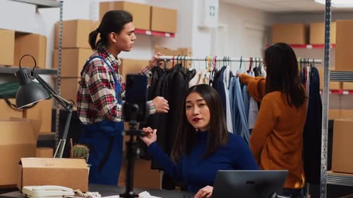 Team of Employees Promoting Retail Store Goods Online