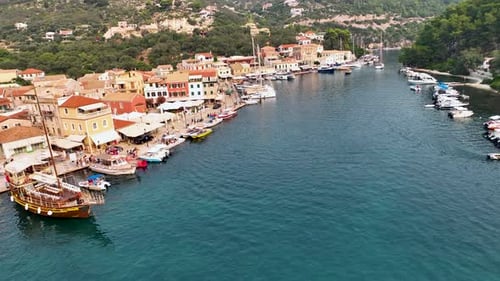 Aerial View of Gaios Harbor on Paxos Island, Greece, Featuring Colorful Venetian Buildings