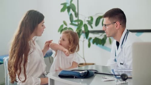 Girl at Doctor's Office with Mother
