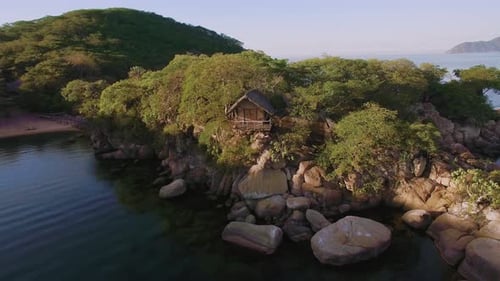 Aerial Drone Quadcopter of Luxury Water Front Hotel Resort on Island, Rustic