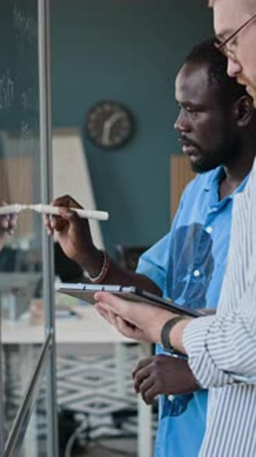 Two Young Men Developing New Code