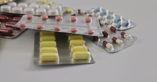 Variety of colorful medicine in blister packs