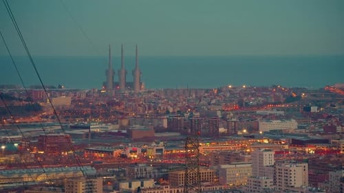 Establishing Shot of Barcelona Skyline From West to East Barcelona City Streets Illuminated and