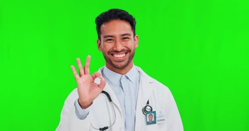 Perfect, green screen and portrait of doctor with review, agreement and success sign isolated