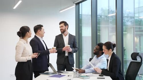 Happy Business Team Working Together in Office