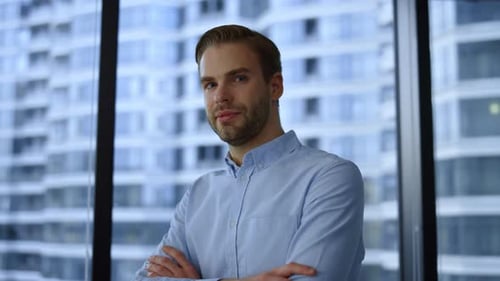 Confident businessman posing in modern office portrait of successful ceo