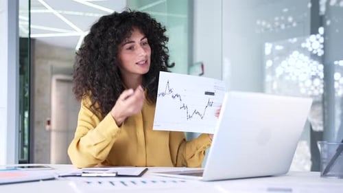 Woman Explains Chart During Virtual Meeting