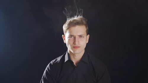 Smoke is coming out of the angry man's head.