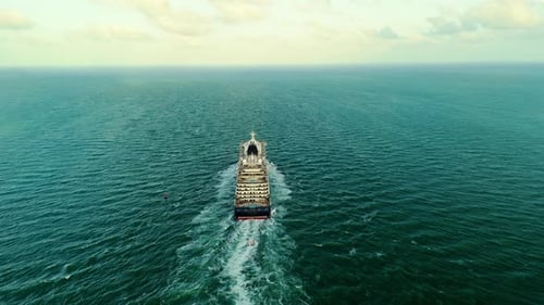 Luxury Cruise Liner Goes to the Sunny Horizon Above Aerial View of Luxury Cruise in the Ocean