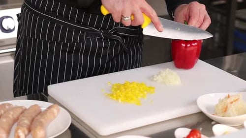 Chef Preparing Pepper on Cutting Board