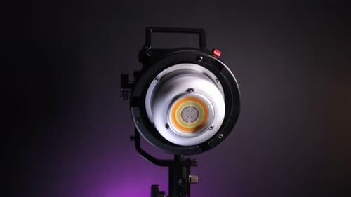 Rear View Of LED Video Light Moving From Left To Right In The Studio. close up