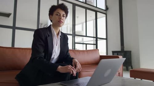 Businesswoman Showing Negative Feedback in Office