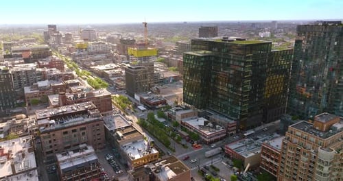 Flyover Chicago city panorama. Busy roads among the multi-storied buildings of metropolis.