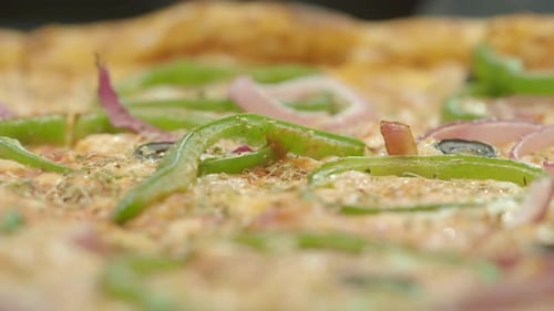 A CloseUp View of a Deliciously Topped Green Pepper Pizza Delight