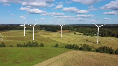 Aerial View of Wind Farm or Wind Park, With High Wind Turbines for Generation Electricity 4K UHD