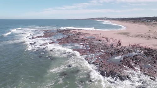 Static Aerial View Rock Cliff and Beach