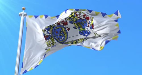 Ornate Royal Coat of Arms Flag Waving Against Blue Sky