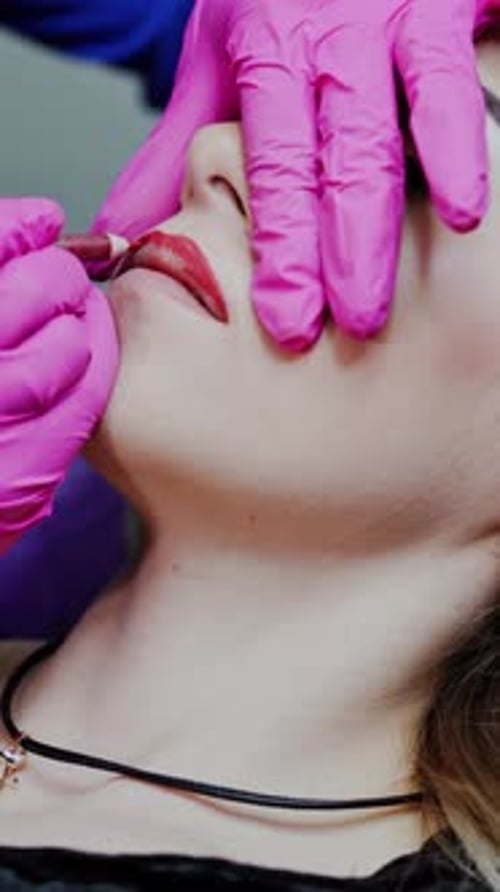 Woman Receiving Lip Augmentation Treatment